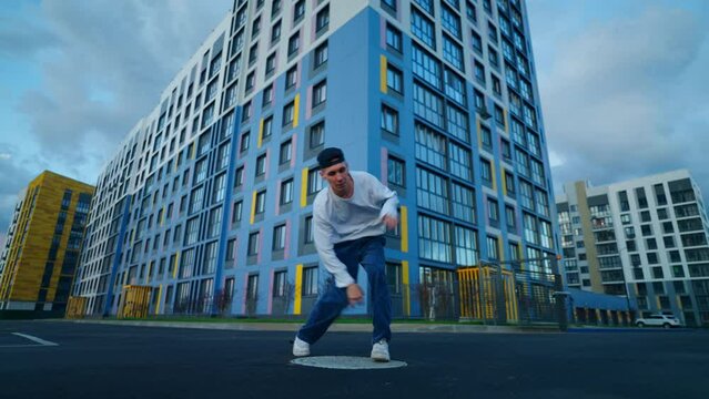 Talented Boy Dancing On City Street In Evening, Full-Length Portrait Of Active Young Man Outdoors