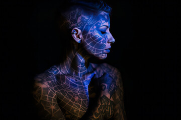 Mysterious androgynous figure covered in glowing, fantasy map tattoos on a simple studio backdrop. Generative AI