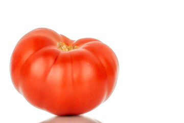 One ripe red tomato, macro, isolated on white background.