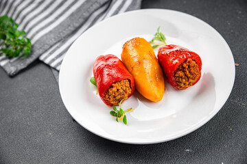 pepper stuffed meat stuffing bell pepper paprika pork, beef, chicken meat meal food snack on the table copy space food background rustic top view 