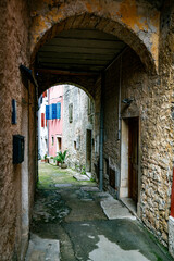 Fototapeta na wymiar bow in a street in the croatia village of vrsar, touristic place
