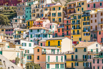 Fototapeta na wymiar Colorful houses on the rock. Old Mediterranean architecture.