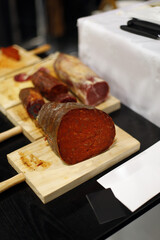 handmade sobrassada on wooden board in the kitchen