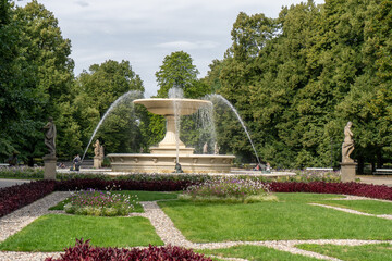 Large old fountain in the park. Warsaw Poland.