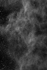 Dynamic black background with splashes of water, creating a unique and eye-catching composition