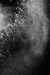 Dynamic black background with splashes of water, creating a unique and eye-catching composition