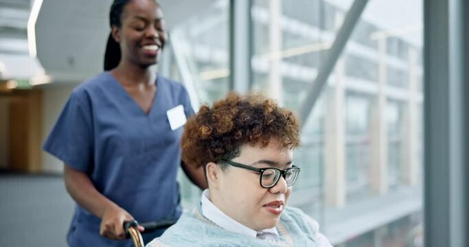 African doctor, woman and wheelchair in corridor, hospital and happy for talking, kindness or help in hallway. Nurse, medical support and caregiver person with disability, chat or patient in clinic