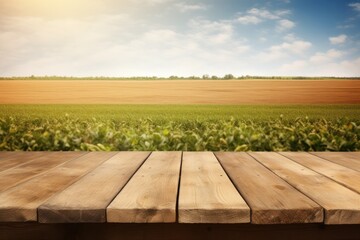 Empty rustic top wood table at gripening soybean field, There is space to place products.