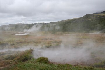 Mist rising from the ground at Geysir Hot Springs in Iceland