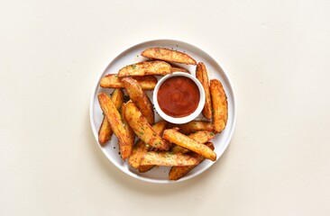 Oven baked potato wedges with sauce