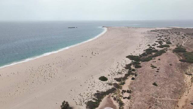 a long empty beach 
