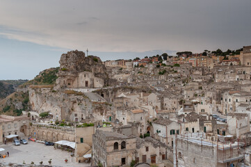 Fototapeta na wymiar Beautiful view of a small town with old stone buildings in the city of Matera in Italy