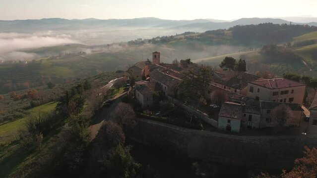 Aerial of the beautiful old buildings of Montecatini Terme in Italy with hills in the background