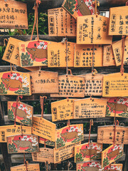 Lucky wish cards in the Buddhist temple in Japan. 