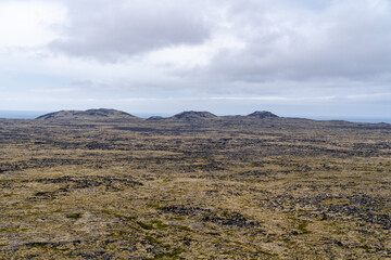 Barren, desolate volcanic landscape of Iceland, as seen from the Saxholl Crater, Snaefellsness Pensinsula