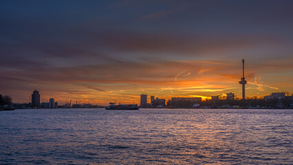 Fototapeta premium Sunset over Maas river in Rotterdam 