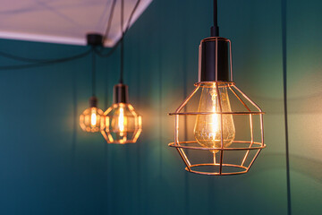 Beautiful copper hanging lamps with decorative bulbs