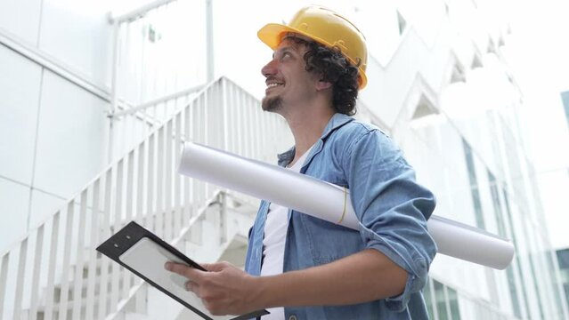 architect man construction engineer worker or inspector stand outdoors