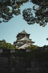 Vertical shot of the Osaka Castle in the daylight in Japan