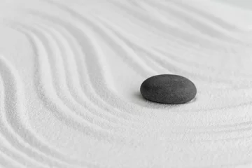  Zen Garden with Grey Stone on White Sand Line Texture Background, Top View Black Rock Sea Stone on Sand Wave Parallel Lines Pattern in Japanese stye, Simplicity Day, Meditation,Zen like concept. © Anchalee