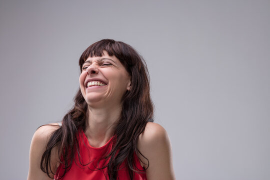 Female mocks others, delighting in their misfortune