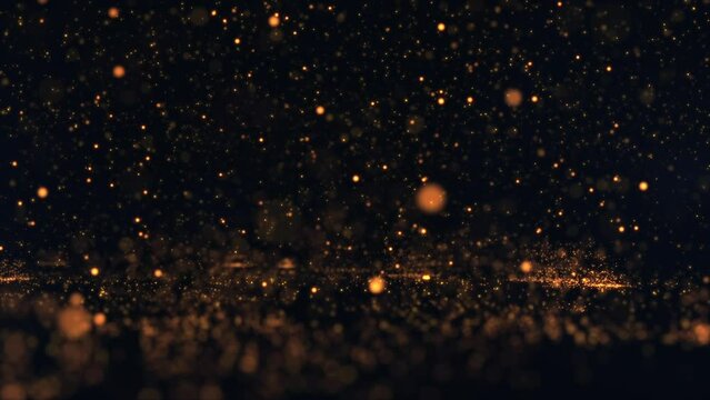 Fiery hot glowing golden sphere particles falling from the sky, bouncing and exploding into sparks. Looping, full HD abstract particle motion background.