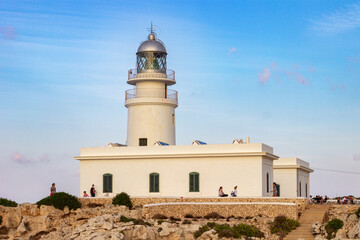 Fototapeta na wymiar Sunset in Cavalleria lighthouse in the north of Menorca (Spain)