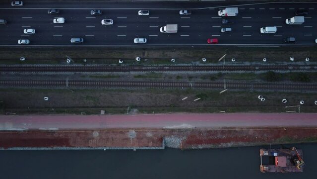 Drone footage over the Avenida Marginal Tiete Highway and the railroad tracks in Sao Paulo, Brazil