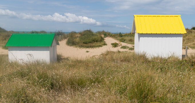 bath houses at a beach in France, in the Normandie