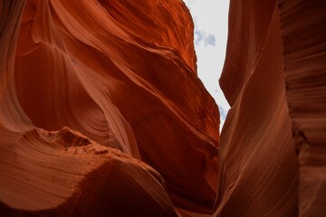 Aerial view of a picturesque landscape featuring a rock formation in the background: Antelope Canyon