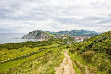 panoramic view of zumaia and the beach of itzurun with the Way of St. James in the foreground