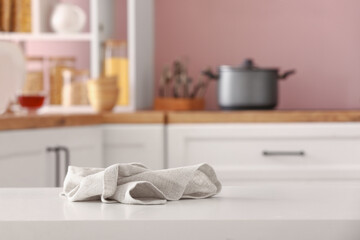 Crumpled napkin on table in kitchen