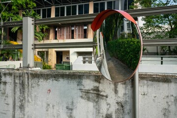 Closeup of a traffic mirror on the street