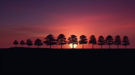 Silhouetted tree line against dramatic Winter sunset with waxing moon in portrait orientation
