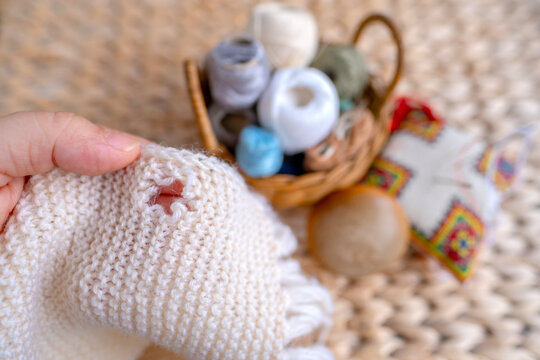 wool sweater with hole on wooden mushroom for darning, materials for repairing clothes, home needlework, Sustainable DIY Fiber Projects