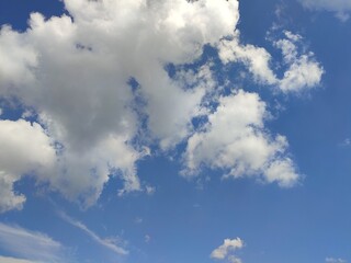 Cloudy sunny blue summer sky