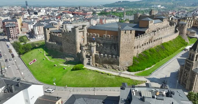Templar castle in Ponferrada, Leon Spain medieval stone walls, towers, flags