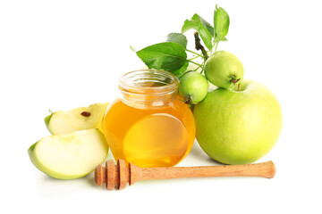 Jar of honey and apples for Rosh Hashanah celebration (Jewish New Year) on white background