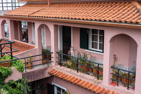 Pink house with balcony