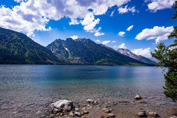 Scenic view of Jenny Lake in Grand Teton National Park, Wyoming in the summertime.
