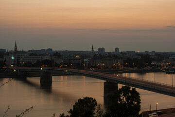 Fototapeta premium Architecture of Novi Sad. Panorama at night of Novi Sad, Vojvodina, Serbia. Cityscape panorama at night. Long exposure. Horizontal image. 