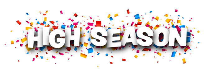 High season sign over colorful cut out ribbon confetti background.