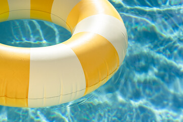 Yellow and white pool float