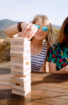 Playing Jenga on Weekend Vacation 