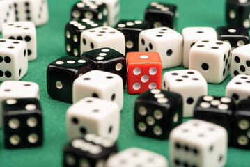 Dice, beautiful dice placed on green felt surface, selective focus.