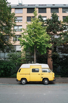 Vintage Yellow Van in an Empty Urban Street