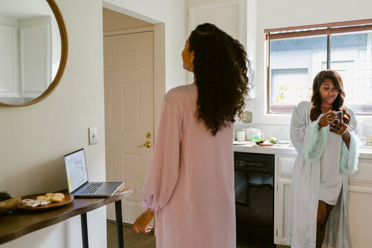 Multiracial women flatmates' morning routine lifestyle