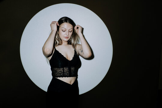 Attractive young woman smoking a cbd joint