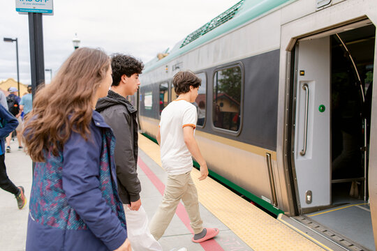 Teens taking public train