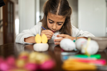painting eggs on easter day